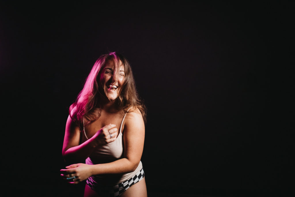joyfilled boudoir; woman smiling; women's empowerment photography by Lindsay Hite