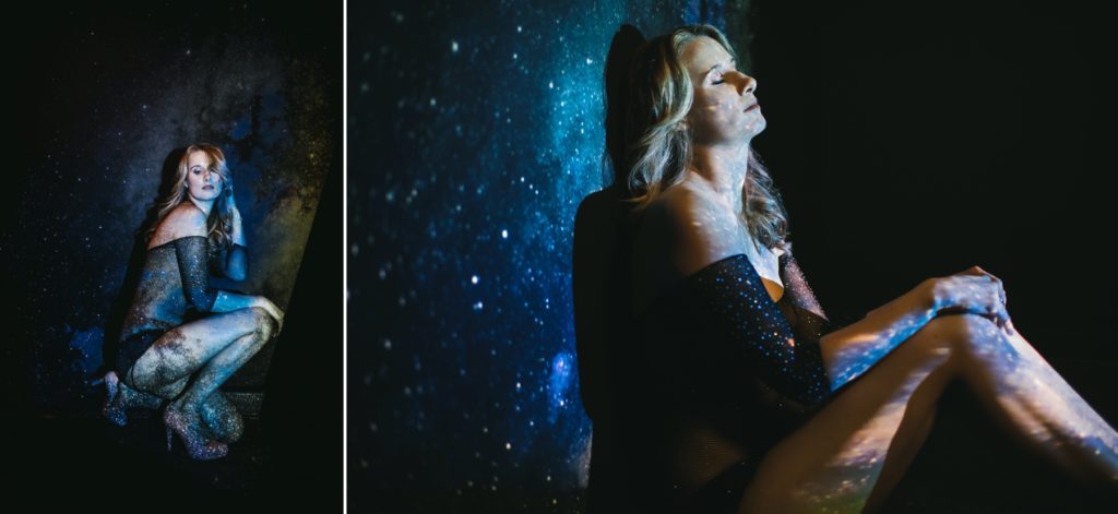 woman in sparkle bodysuit with galaxy background, boudoir photography by Lindsay Hite