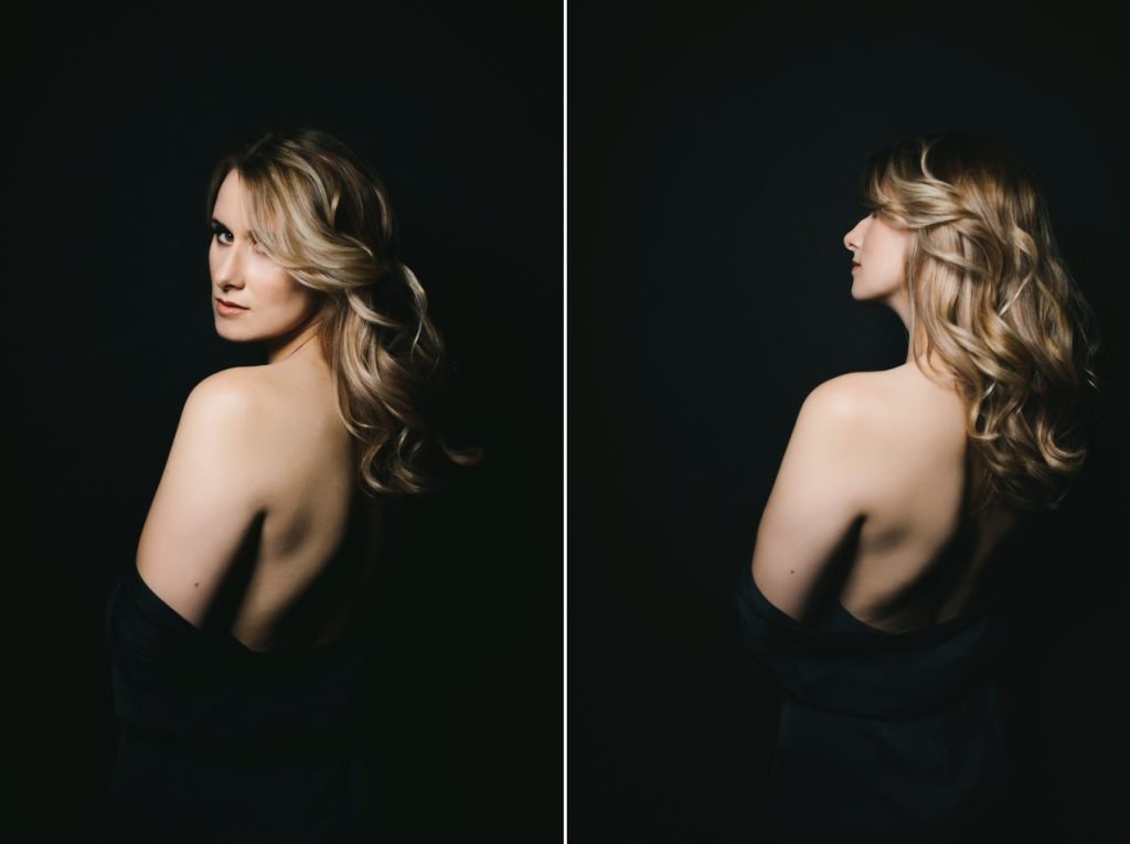 Side by Side, blonde with revealed shoulder, black background; boudoir photography by Lindsay Hite