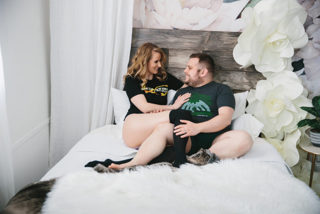 Couple sitting on bed in comfy clothes, Couples Spark Session by Lindsay Hite