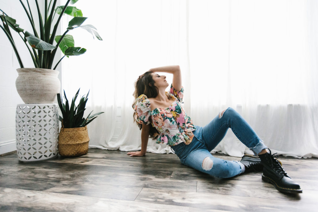 Woman in floral top, jeans, and combat boots, what do I wear, photography by Lindsay Hite