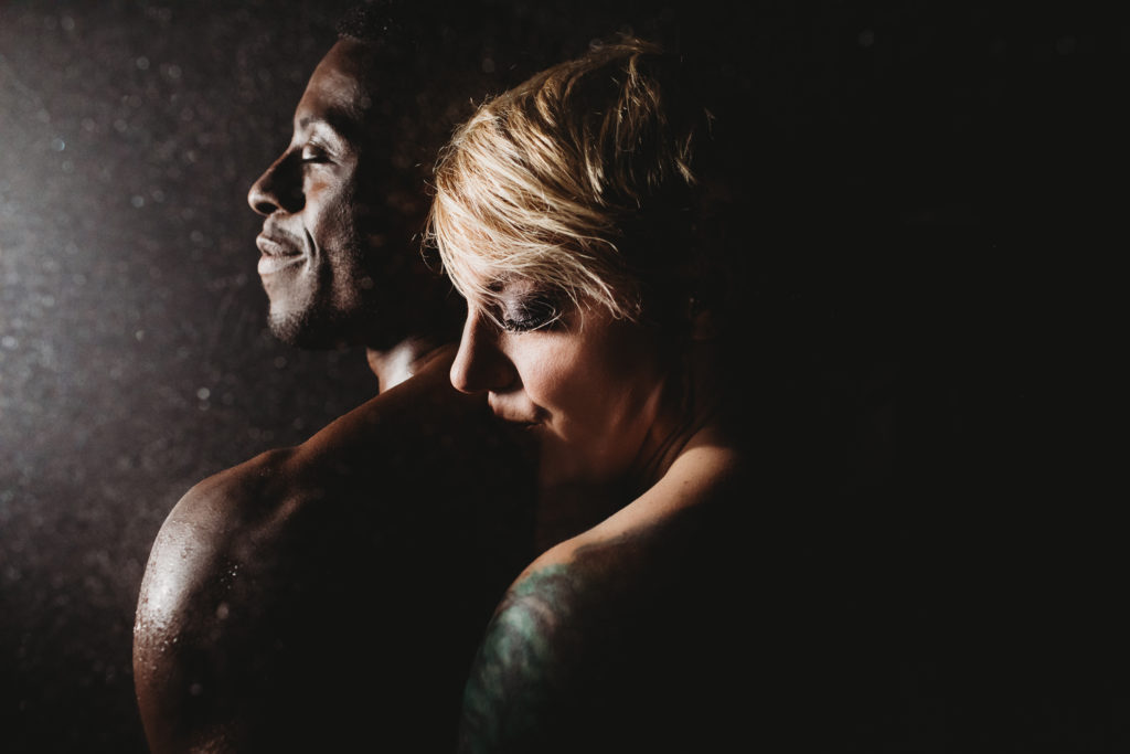 Shower scene of a couple; couples boudoir photography by Lindsay Hite