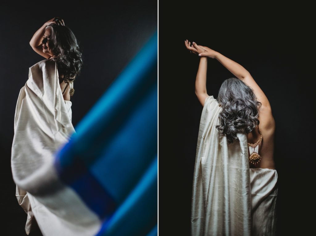 Woman in sari with black backdrop, artistic image by Lindsay Hite