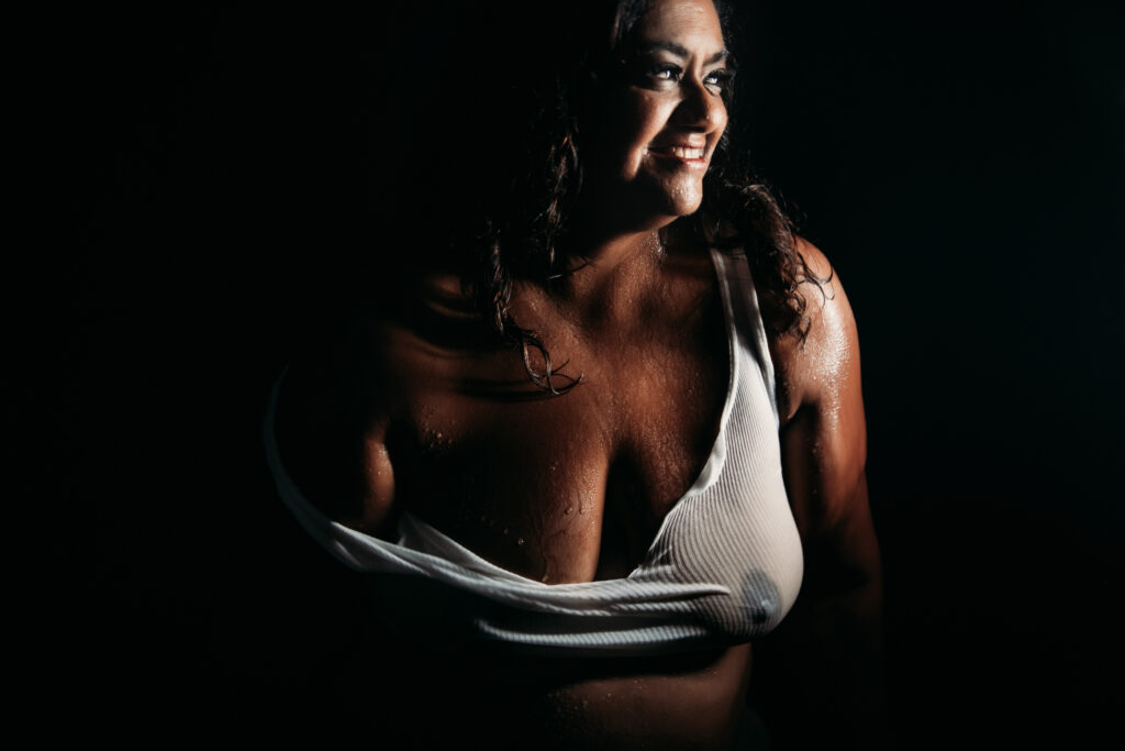 plus sized woman in white wet t-shirt; boudoir photography by Lindsay Hite