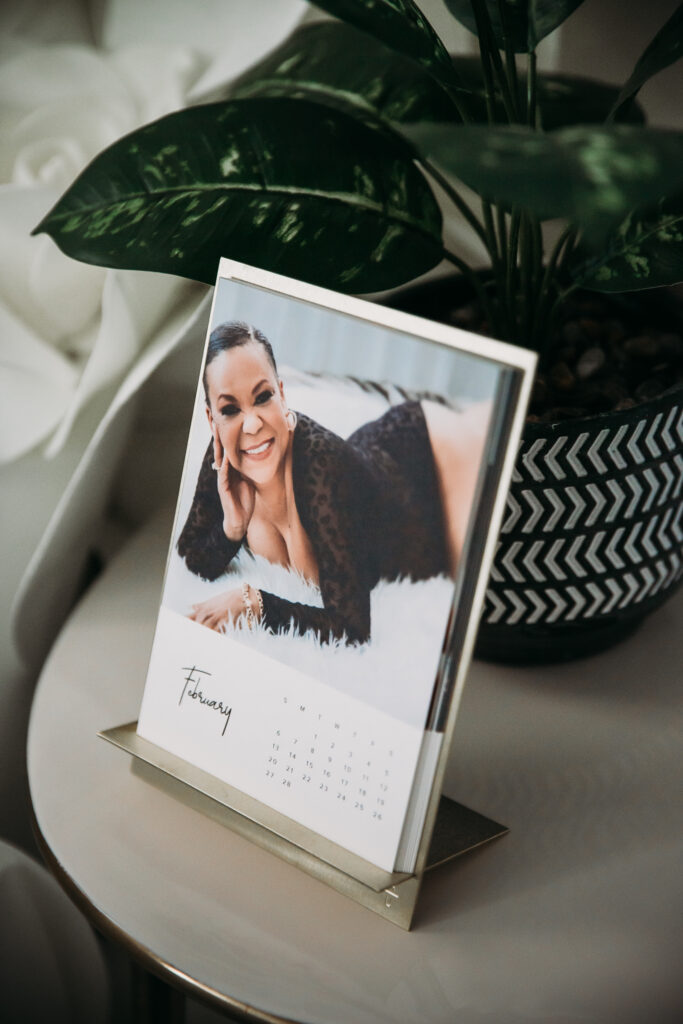 Customizable calendar on brass stand featuring boudoir photography, by Lindsay Hite