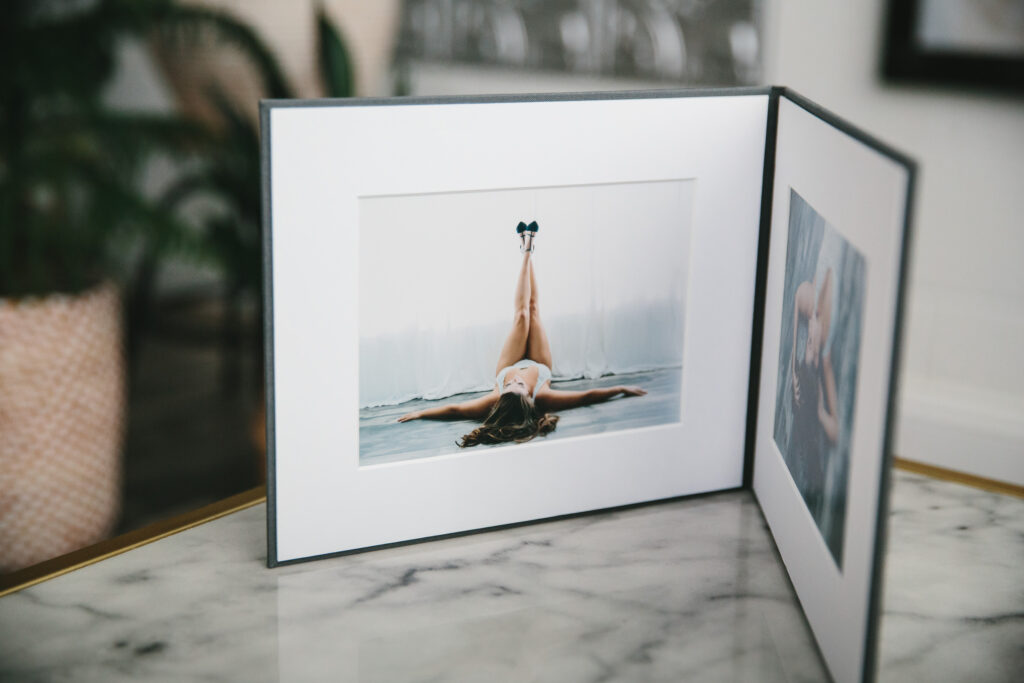 Two-panel matted print folio of boudoir images; by Lindsay Hite