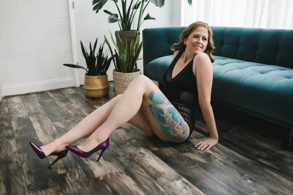 Woman in black lingerie and purple heels.  Boudoir photography by Lindsay Hite. 